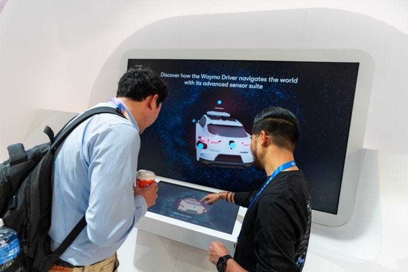 Waymo at CES 2026 — Interactive 3D product exhibit by Cognition